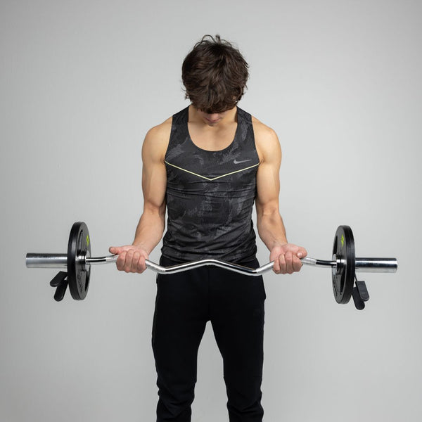 The Benefits of Barbells and Plates in Your Routine