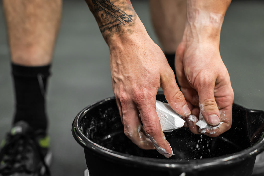 Athlete holding RAGE Fitness Chunk Chalk in their hands